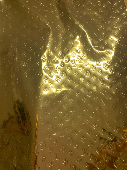 Gold Embossed LV Leather Fabric